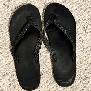 Black rainbow flip flops